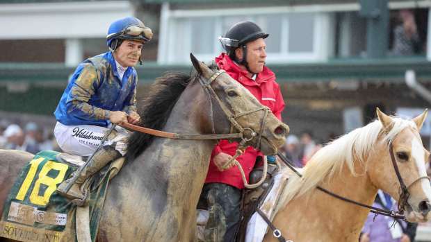 Sovereignty and jockey Junior Alvarado are led back to the winner's circle after winning the 2025 Kentucky Derby