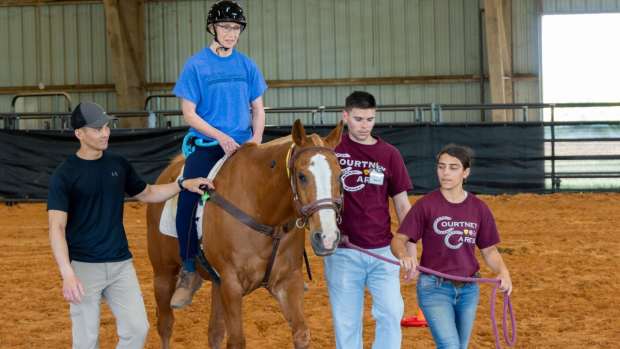 A participant in a Texas A&M study rides as part of equine-assisted therapy for Parkinson’s disease — a promising approach researchers say may improve balance, coordination and quality of life for patients through the rhythmic movement of horseback riding.  
