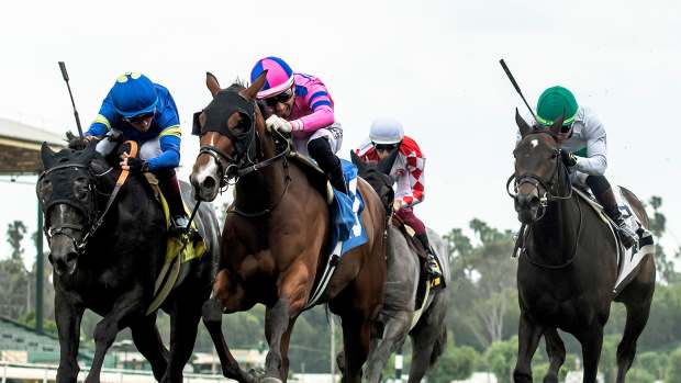 Firenze Flavor, outside, with Drayden Van Dyke aboard, outfinishes Miso Phansy, center, and favorite and pacesetter Jungle Peace by the slimmest of margins in the Honeymoon (G3)