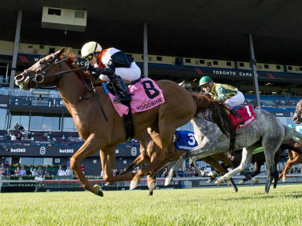 Ocean Club and Sofia Vives winning the Grade 2 Nassau
