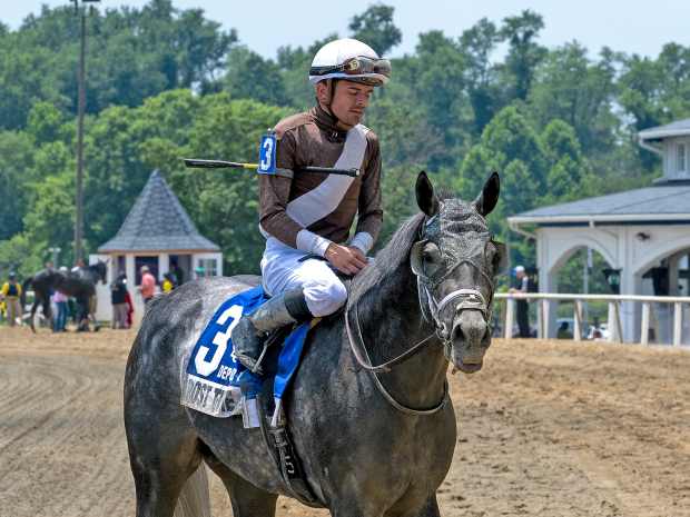 Deputed Testamony winner Post Time and jockey Sheldon Russell