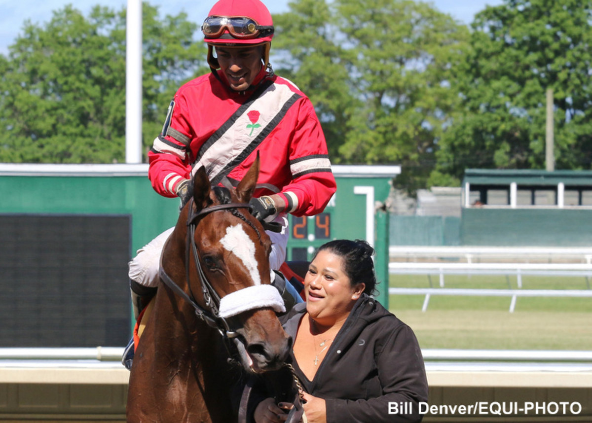 Trainer Faith Wilson celebrates her first career victory with La Luisa and jockey Isaac Castillo after winning the 9th race at Monmouth Park on Monday May 31, 2021.  Photo By Bill Denver/EQUI-PHOTO