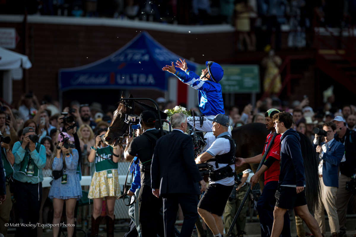Junior Alvarado celebrates Sovereignty's victory in the 2025 Belmont Stakes
